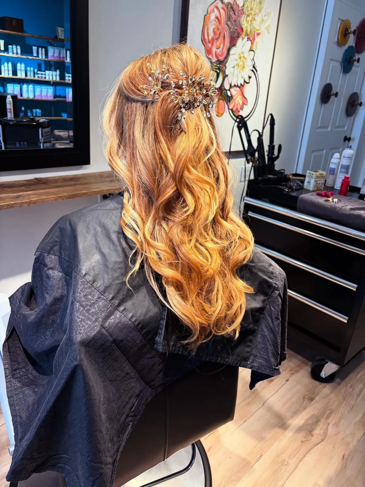 Long styled wedding hair with soft waves, done at Blue Note Hair Studio