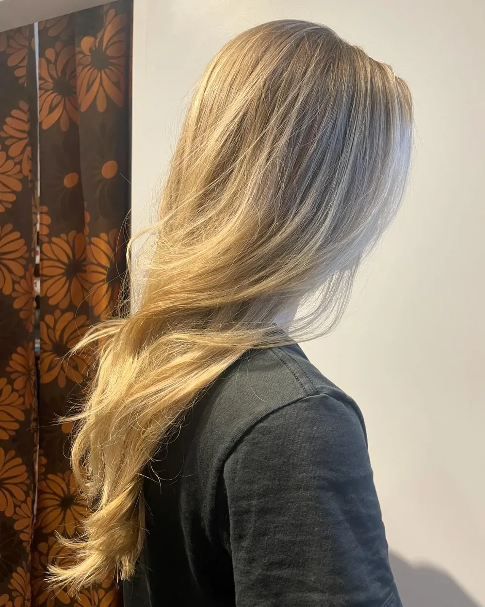 Long blonde lived-in colour with soft natural growout